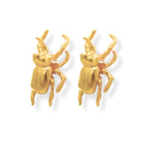 Aretes de escarabajos rinoceronte medianos vista lateral